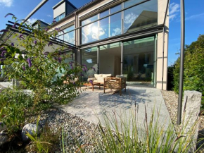 Sport'INN - Luxuriöses Ferienhaus mit privatem Gym und Südterrasse im Chiemsee-Alpenland - 136 qm